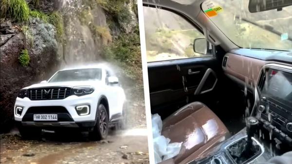 Tài xế tắm thác miễn phí trong xe cửa sổ trời và loa bị dột